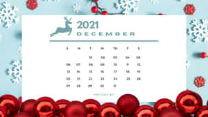 2021年12月日曆，裝飾有紅色裝飾品和白色雪花。 — 可愛聖誕節 壁紙