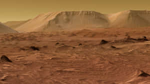 火星表面，橙色天空下有沙丘和平頂山 — 火星人布魯諾 壁紙