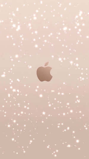 玫瑰金色 Apple 標誌，腮紅背景上帶有白色閃粉。 — 紅色美學 iPhone 壁紙