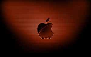 發光的Apple標誌在帶有紋理的深紅色背景上，帶有暈影。 — 4K Apple 壁紙