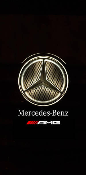 黑暗背景上發光的Mercedes-Benz AMG標誌 — Mercedes Benz C300 壁紙