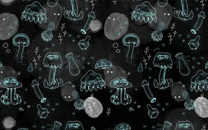青綠色發光的水母和海洋生物漂浮在深色抽象水下圖案中。 — 灰色 壁紙