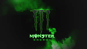 發光綠色Monster Energy標誌，帶有煙霧效果，深色背景。 — 漫威標誌 壁紙