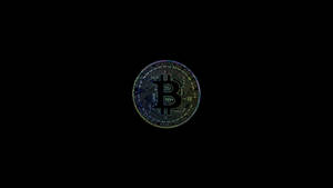 黑色背景上帶有電路圖案的發光比特幣標誌 — 比特幣 GIF 壁紙