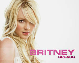 白底粉紅色文字的Britney Spears肖像。 — 小甜甜布蘭妮 壁紙