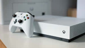 白色Xbox主機和控制器在白色表面上。 — 酷炫遊戲 壁紙