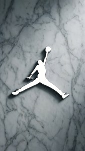 白色Jordan標誌剪影在大理石背景上