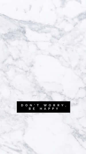 白色大理石紋理，帶有寫著 don't worry be happy. 的黑色文字框。 — 快樂 壁紙