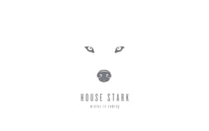 冰原狼標誌，附有文字 House Stark 和 winter is coming — 桌面 壁紙