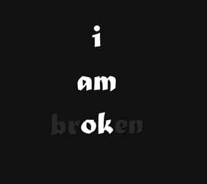 黑色橫線紙張背景上顯示文字「i am broken」 — 獨自一人 壁紙
