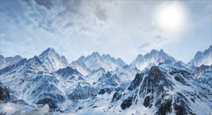 陽光普照、雲朵散落的雪山山脈 — 冬季風景 壁紙