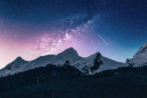 積雪的山脈在星空下，有銀河和流星 — 星空動畫 壁紙