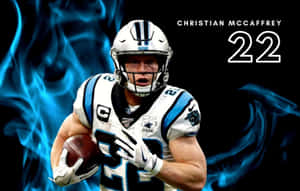 足球運動員Christian McCaffrey在藍色火焰背景下持球奔跑。 — 卡羅來納黑豹隊 壁紙