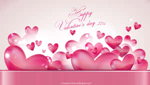 閃亮粉紅心形漂浮，帶有「Happy Valentine's Day 2016」文字。 — 16:9 壁紙