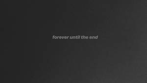 深灰色紋理背景，中央有微弱文字顯示「forever until the end」。 — 灰色美學動圖 壁紙