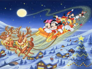米奇老鼠和朋友們在夜間乘坐雪橇飛越白雪覆蓋的村莊。 — 新年快樂 壁紙