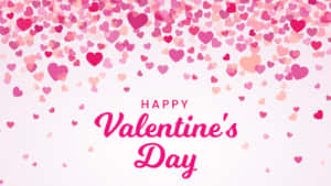 粉紅心形落在白色背景上的「Happy Valentine's Day」文字上。 — 16:9 壁紙