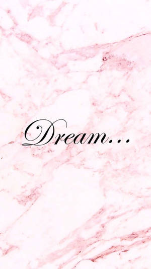 粉紅色大理石紋理，帶有黑色草書文字 Dream — Instagram限時動態 壁紙
