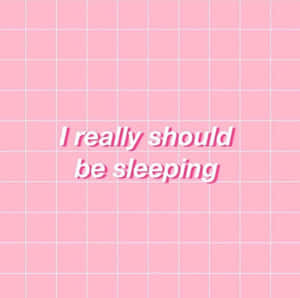 粉紅色網格背景，文字寫著 I really should be sleeping — 美學粉色GIF 壁紙