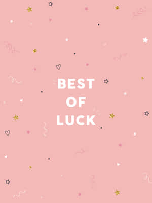 粉紅色背景，帶有「BEST OF LUCK」文字和節日裝飾。 — iPad 第9代 壁紙
