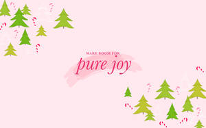 粉紅色背景上，綠色松樹和拐杖糖圍繞著文字 pure joy。 — 喜悅 壁紙