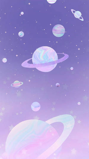 在繁星點點的紫色天空中漂浮的帶有光環的粉彩行星。