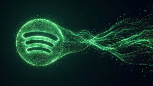 由粒子組成的發光綠色Spotify標誌流動成波浪。 — Spotify 壁紙