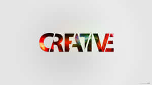 白色背景上帶有火熱和宇宙紋理的CREATIVE字樣。 — 桌面美學 壁紙