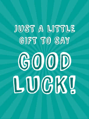 青綠色背景，白色文字以爆發圖案顯示「Just a little gift to say Good Luck!」。 — iPad 第9代 壁紙