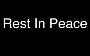 黑色背景上寫著Rest In Peace的白色文字 — 省電 壁紙