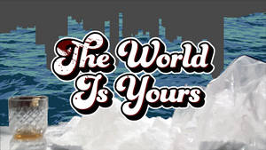 加冰威士忌杯，粗體文字 'The World Is Yours' 以城市和海洋為背景。 — 世界是你的 壁紙