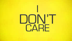 在明亮的黃色背景上，粗體黑色文字寫著 I DON'T CARE。 — 螢幕保護 壁紙