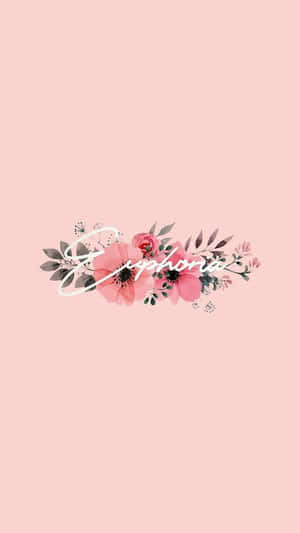 粉紅色花卉設計，在柔和的粉紅色背景上以白色字體寫著Euphoria。 — 粉紅色美學桌面 壁紙