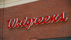 Walgreens商店標誌在磚砌建築上 — 美國 壁紙