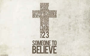 由詩篇23篇經文形成的十字架，下方有「Someone to Believe」。 — 教堂 壁紙