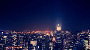 紐約市夜景，閃爍的摩天大樓和燈火通明的帝國大廈。 — 東京鐵塔 壁紙