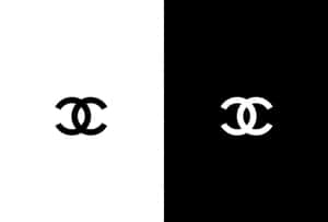 Chanel 標誌以黑底白字和白底黑字的分割背景顯示。 — 香奈兒標誌 壁紙