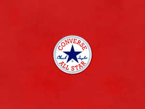 紅色布料背景上的 Converse All Star 標誌貼布 — 4:3 壁紙