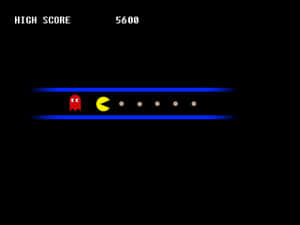 Pacman 遊戲畫面，顯示黃色 Pacman 和紅色鬼魂，最高分數 5600。 — 旁遮普國王 壁紙