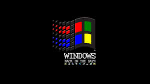復古 Windows 標誌，帶有「Back in the Days」文字和像素圖標，背景為黑色。 — 深色窗戶 壁紙