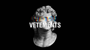 大理石半身像，故障眼睛，黑色背景上 VETEMENTS 文字 — 乾淨 壁紙