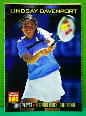 網球運動員 Lindsay Davenport 在比賽中揮拍擊球。 — 運動 壁紙