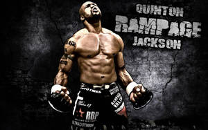 運動型戰士 Quinton Rampage Jackson 身穿戰鬥裝備，舉起拳頭咆哮。 — 終極格鬥冠軍賽 壁紙