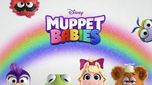 Muppet Babies角色在彩虹周圍漂浮，帶有迪士尼標誌。 — 妙妙熊仔 壁紙