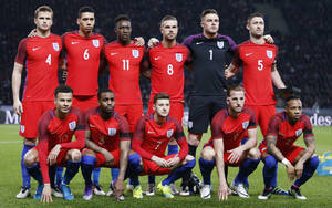 英格蘭國家足球隊在草地上為團隊合照擺姿勢。 — FIFA 世界盃 壁紙