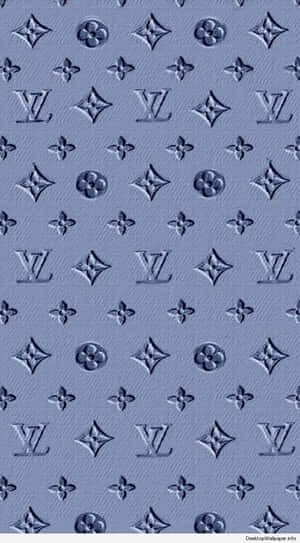 帶有壓花 Louis Vuitton 字母組合和花卉圖案的藍色紋理壁紙。 — 標誌 壁紙