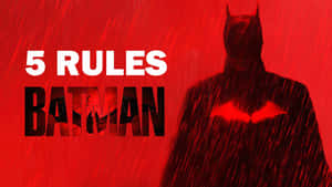 蝙蝠俠剪影在紅色雨中，附有「5 RULES BATMAN」文字 — 蝙蝠俠 2022 壁紙