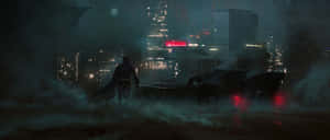 蝙蝠俠和蝙蝠車在雨夜的高譚市，霓虹燈閃爍。 — 蝙蝠車 壁紙