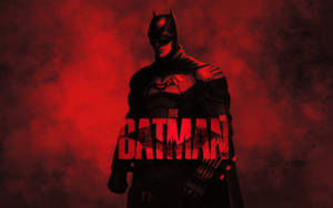 蝙蝠俠在紅色煙霧背景中，帶有「The Batman」標題。