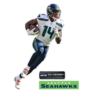西雅圖海鷹隊美式足球員D.K. Metcalf持球奔跑。 — Dk Metcalf 壁紙
